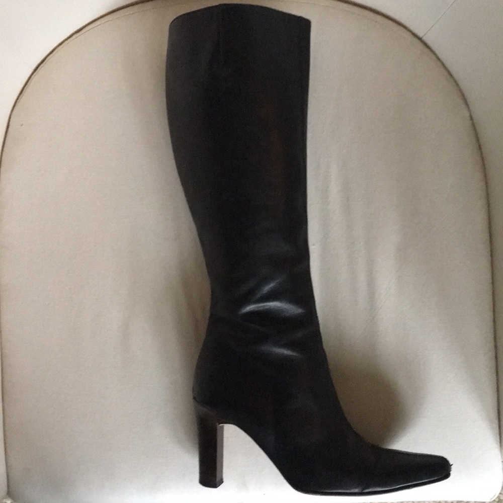 Crew heeled black leather boots